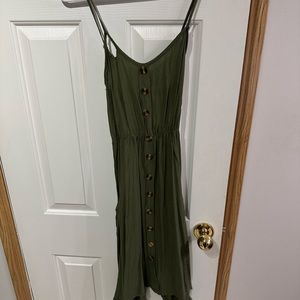 Army green, spaghetti strap dress.